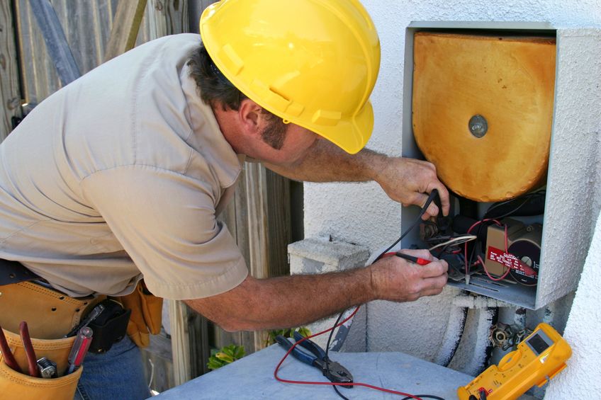 204057 - an ac tech working on a heat recovery unit.