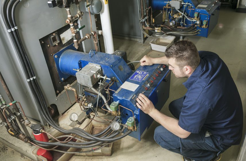 repairman engineer or inspector who check the system.