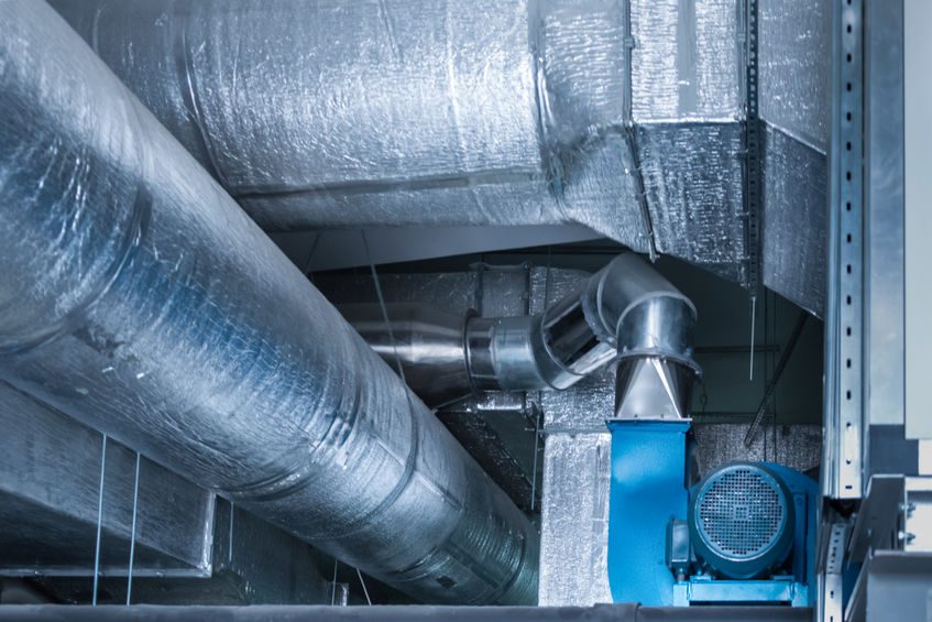 Blue centrifugal fan with huge industrial ductworks